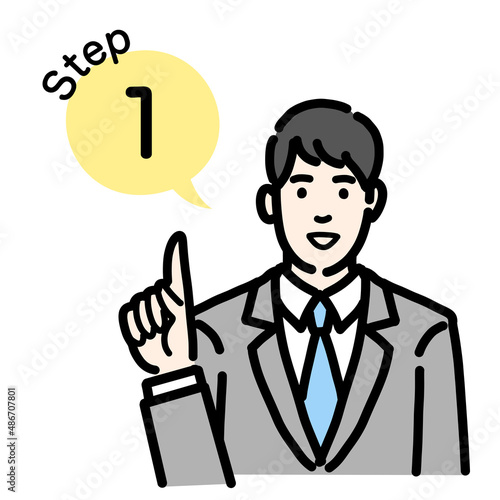 手順について説明をしているスーツを着た若い男性のバストアップ
