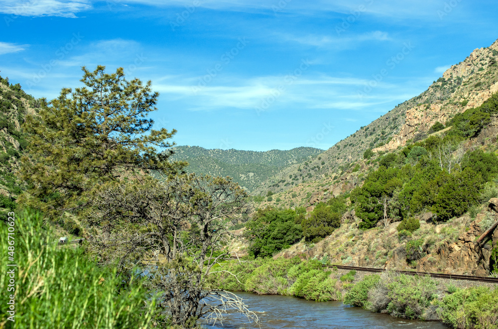 Fototapeta premium Calm waters amoung mountain and hills