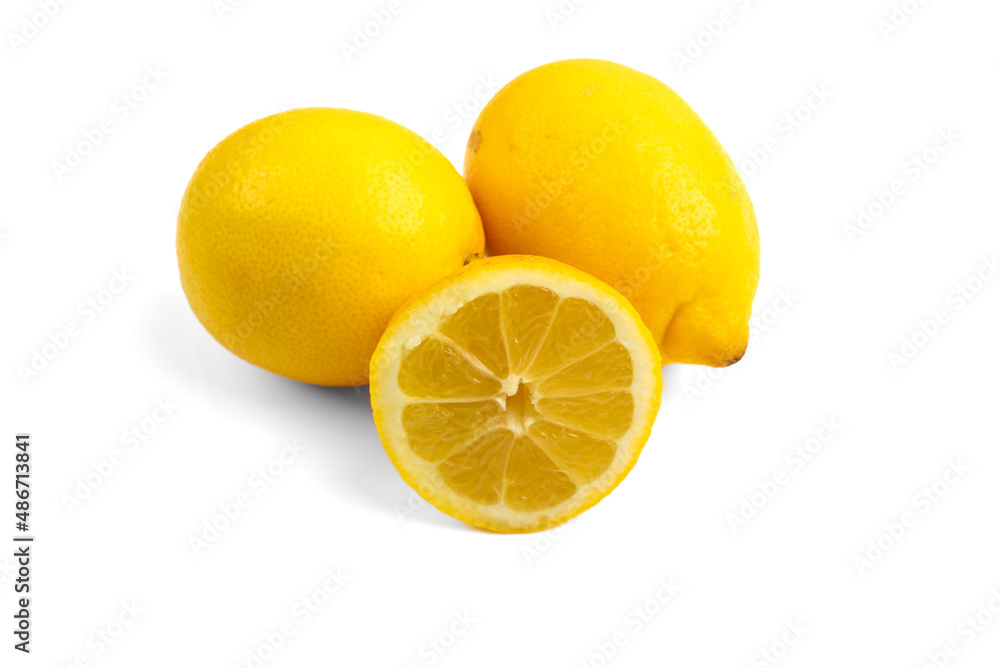 horizontal photo of lemons, one cut in half. isolated on a white background with copy space