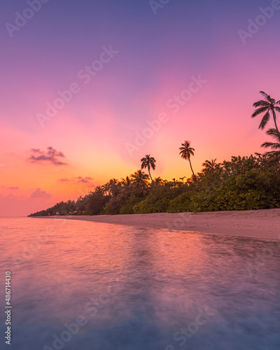 Fantastic closeup view of calm sea water waves with orange sunrise sunset sunlight. Tropical island beach landscape  exotic shore coast. Summer vacation  holiday amazing nature scenic. Relax paradise
