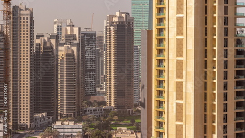 Skyscrapers at the Business Bay in Dubai aerial all day timelapse, United Arab Emirates