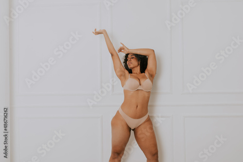 Plus size woman posing for body acceptance photo