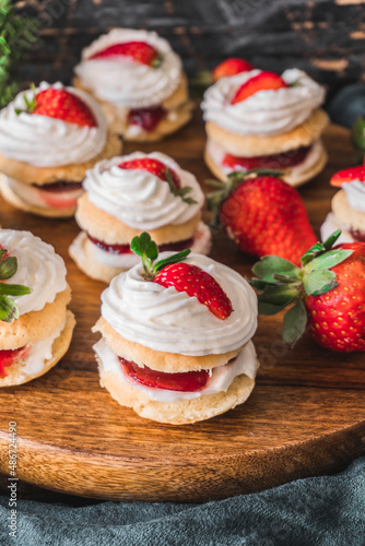 Mini Victoria sandwich cake. Sponge cake is a light cake made with egg whites, flour and sugar. Selective focus shot.