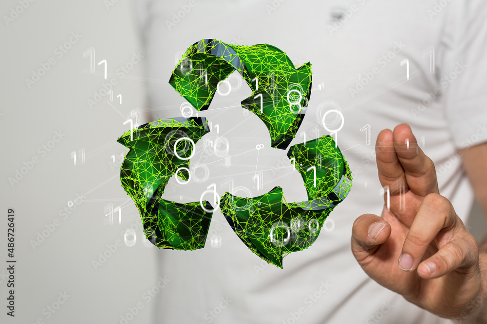 hand holding green recycle symbol hand holding green recycle symbol