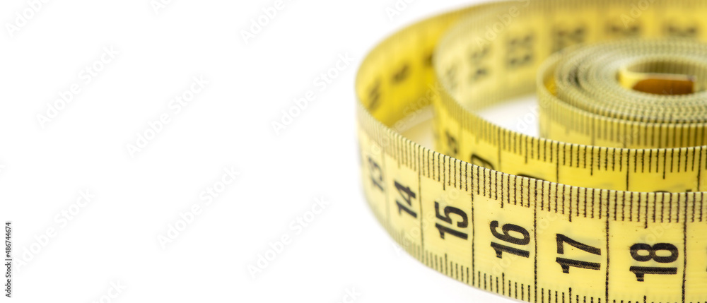 Yellow measuring tape isolated on white background Yellow measuring tape isolated on white background
