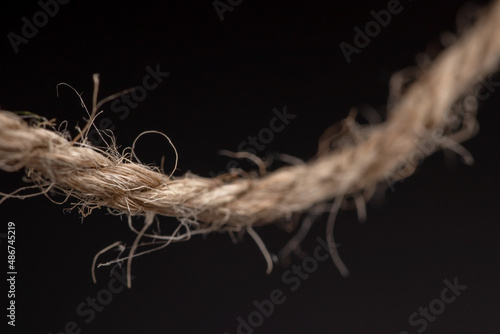 Fototapeta Naklejka Na Ścianę i Meble -  Coil of rope on dark background