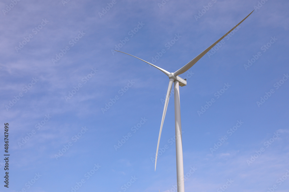 Wind energy.windmills against the blue sky.Ecological energy generation.Wind power plant.copy space.  Energy concept.