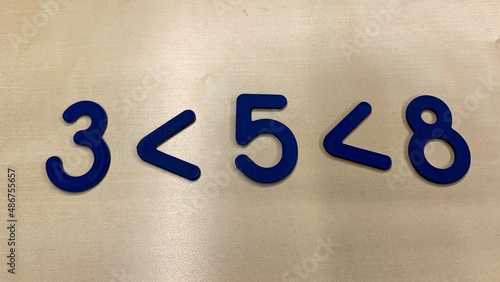 Obraz na plátně Plastic numbers and figures for the development of the child's intelligence, sim