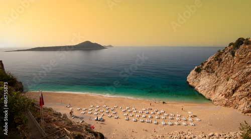 Fototapeta Naklejka Na Ścianę i Meble -  Kaputas Beach with morning sun in autumn. Kaputaş beach is on the Mediterranean coast of Turkey. It is one of the most popular beaches in Turkey. Kas district, Antalya