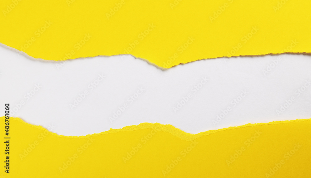 Yellow paper with torn edges isolated with white colored paper background inside. Good paper texture Yellow paper with torn edges isolated with white colored paper background inside. Good paper texture