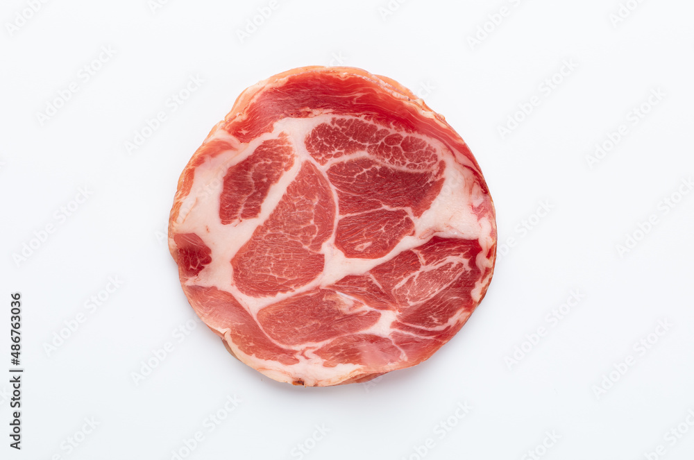 Italian prosciutto crudo or jamon. Raw ham. Isolated on white background. Italian prosciutto crudo or jamon. Raw ham. Isolated on white background.