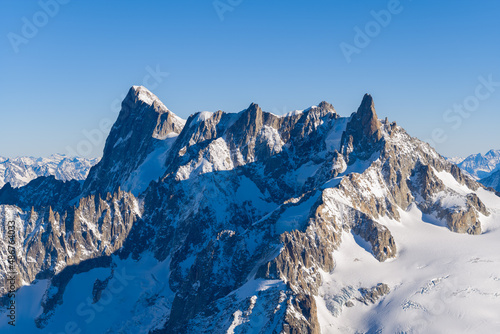 Aiguille Verte, Du Jardin, Les Drus and Les Droites in Europe, France, Rhone Alpes, Savoie, Alps, in winter on a sunny day.
