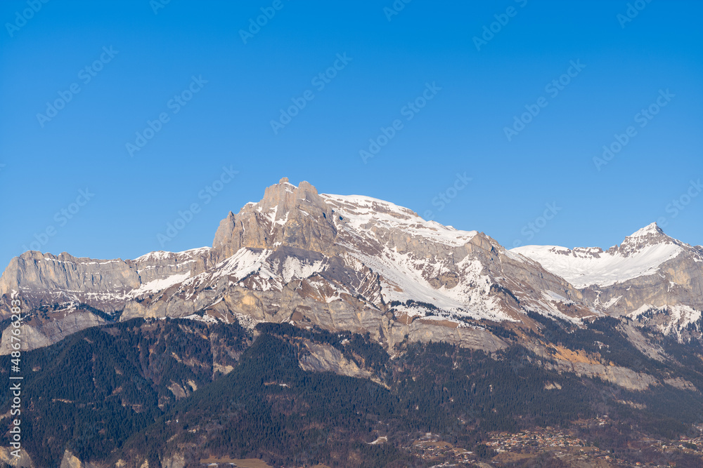 The panoramic view of Tete du Colonney, Aiguille Rouge and Varan in Europe, France, Rhone Alpes, Savoie, Alps, in winter on a sunny day.