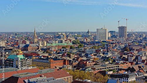 Aerial view on the rooftops, towers and train station of the city of Antwerp, Flanders, Belgium 