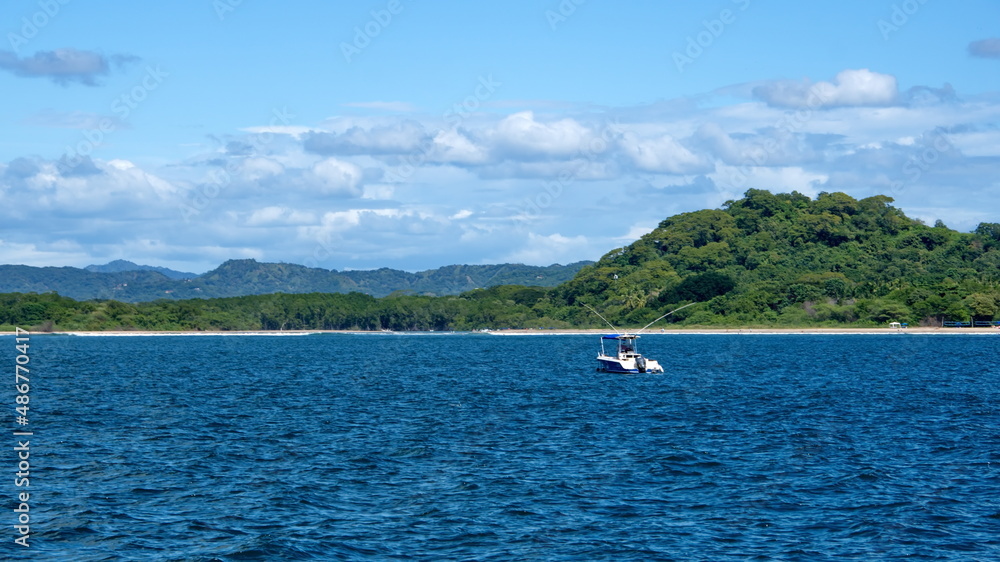 Boat moored in the bay in Tamarindo, Costa Rica