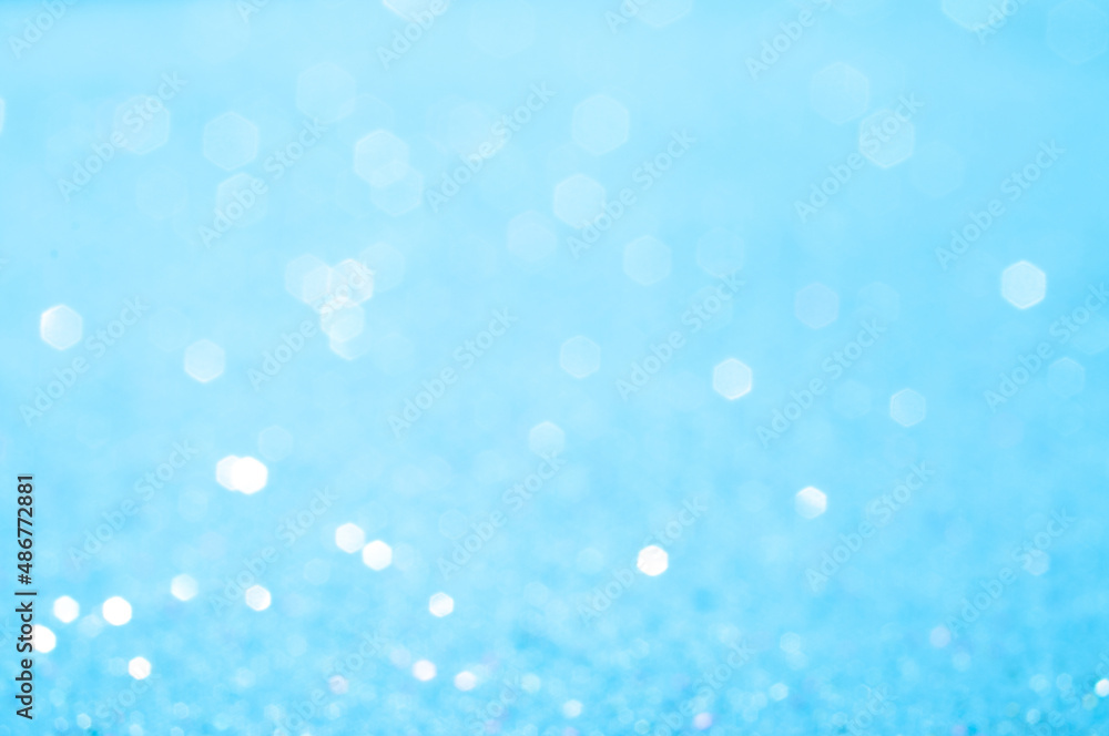 Blue blurred abstract background with bokeh circles