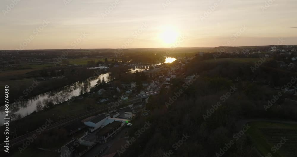 Aerial shot of the city of Montrichard in the Loire Valley, in France, during winter. The medieval castle, church and bridge are iconic to this town. Montrichard sits in the valley of Le Cher. Aerial shot of the city of Montrichard in the Loire Valley, in France, during winter. The medieval castle, church and bridge are iconic to this town. Montrichard sits in the valley of Le Cher.