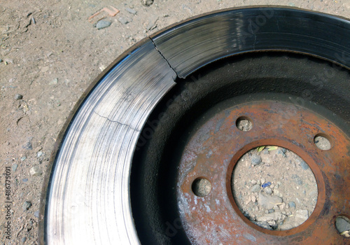 Cracked worn car brake disc.