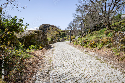 a cobbled road entering Castelo village (Telões), Vila Pouca De Aguiar, district of Vila Real, Portugal photo