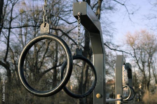 Gymnastic rings in outdoor gym (photo taken in a late afternoon sunlight)