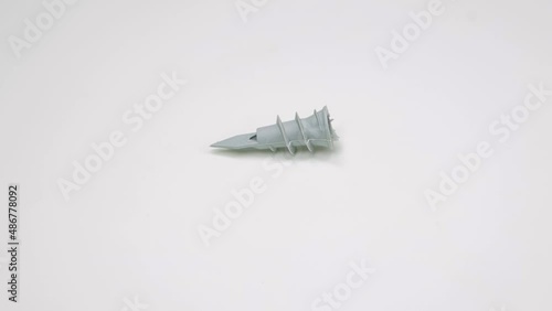 driva, a plastic fastener for a drywall wall on a white background photo