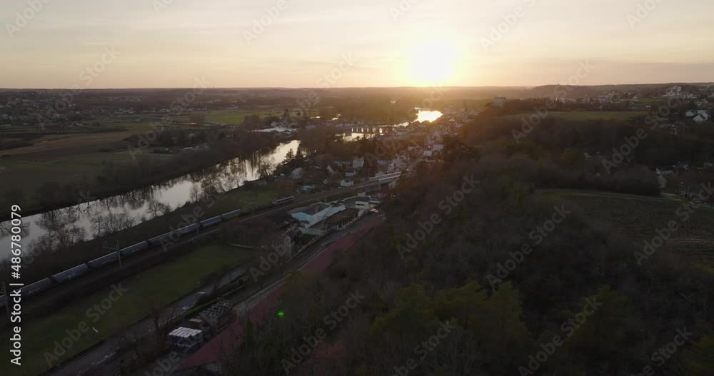 Aerial shot of the city of Montrichard in the Loire Valley, in France, during winter. The medieval castle, church and bridge are iconic to this town. Montrichard sits in the valley of Le Cher. Aerial shot of the city of Montrichard in the Loire Valley, in France, during winter. The medieval castle, church and bridge are iconic to this town. Montrichard sits in the valley of Le Cher.