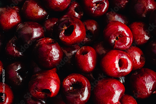 Freshly Pitted Cherries in a Small Bowl: Overhead view of a bowl of pitted cherries