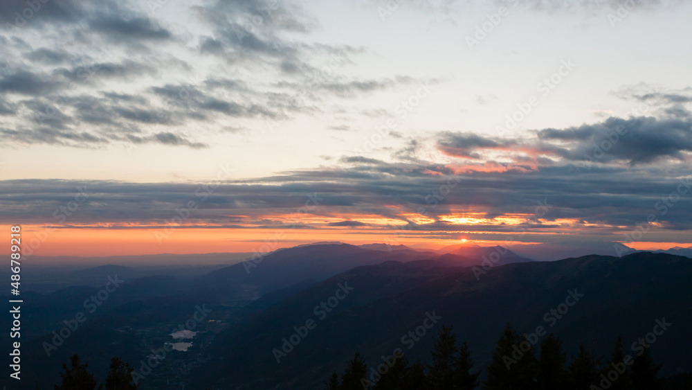 Sunset from Pizzoc mount top. Cansiglio woodland, Italy