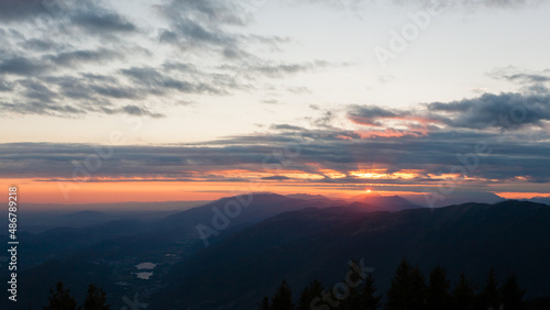 Sunset from Pizzoc mount top. Cansiglio woodland, Italy photo