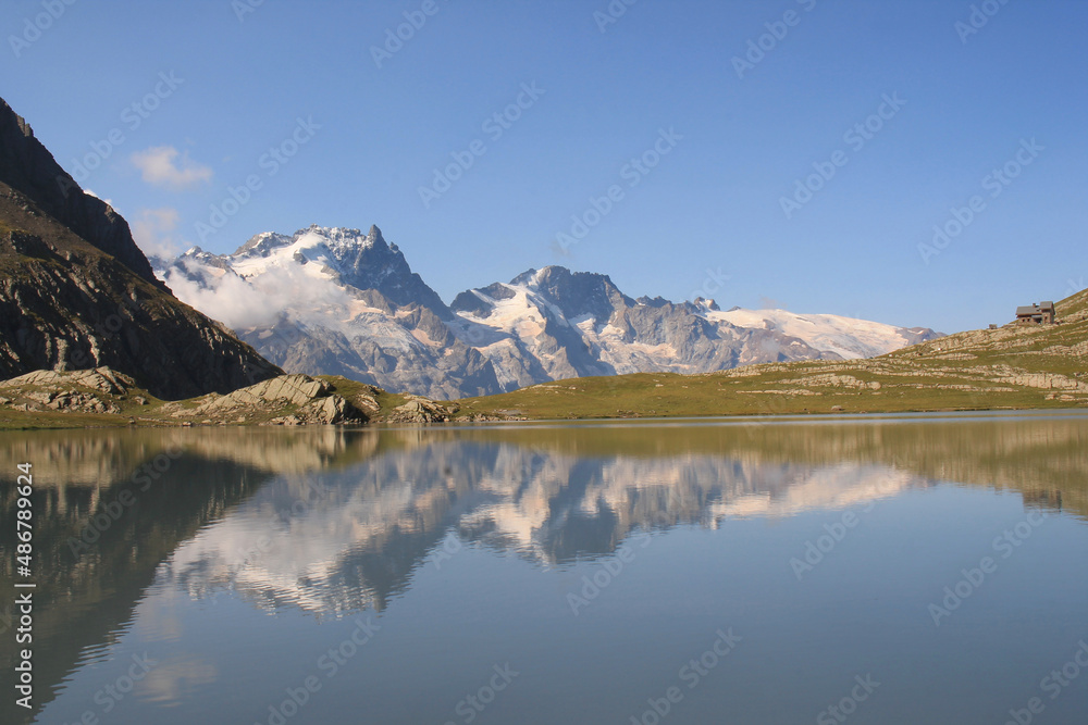 Goleon lake in the french Alps with view on La Meije mountain 