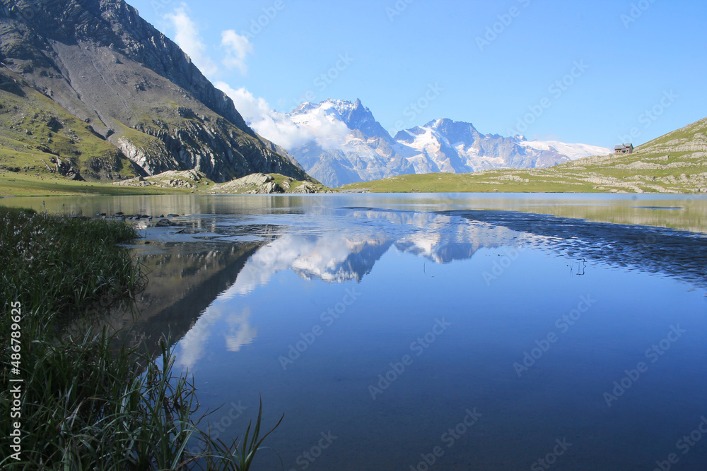 Goleon lake in the french Alps with view on La Meije mountain 