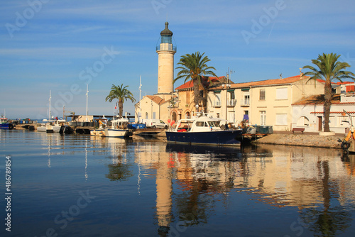 Lighthouse and old fishing port of Grau du roi in Camargue, a resort on the coast of Occitanie region in France 