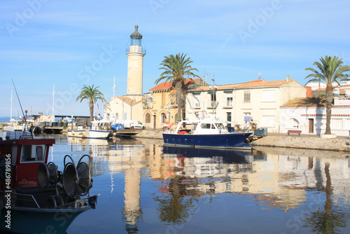 Lighthouse and old fishing port of Grau du roi in Camargue, a resort on the coast of Occitanie region in France 