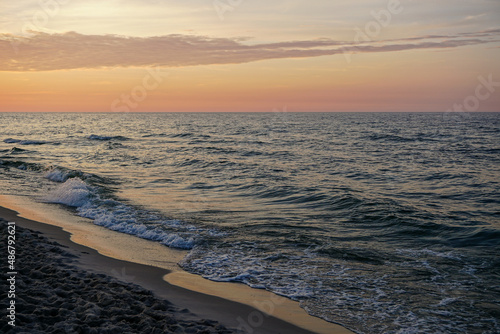 A calm sea at dawn