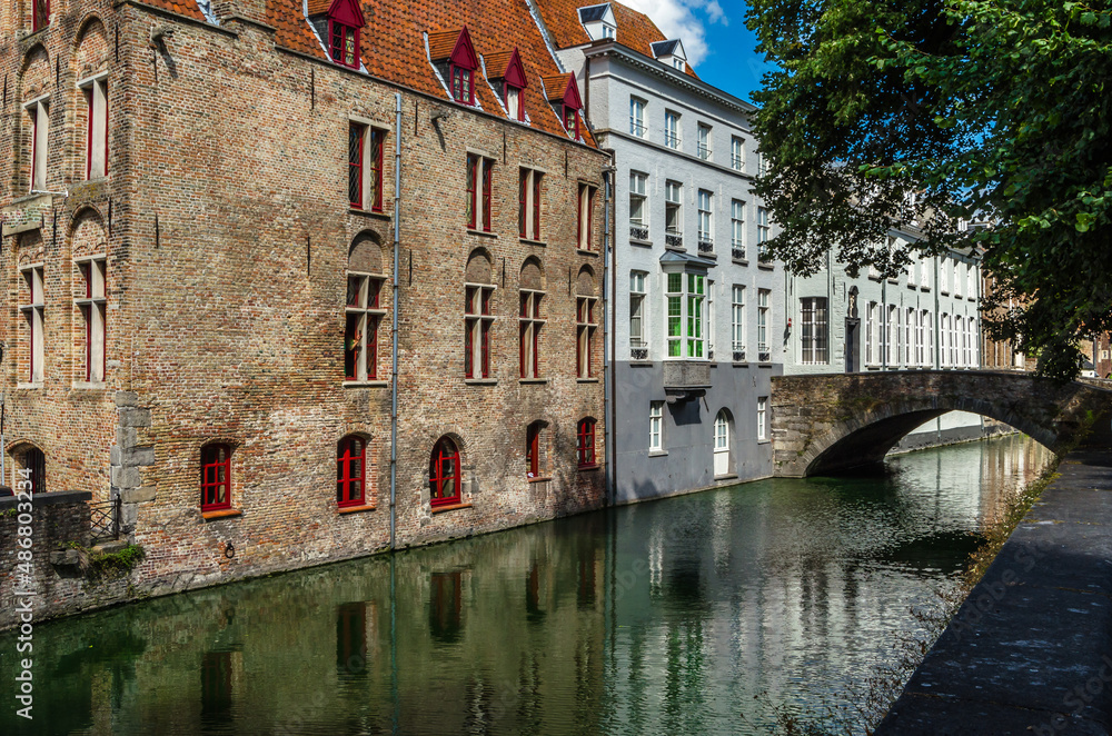 Old buildings along the canal in Bruges, Belgium