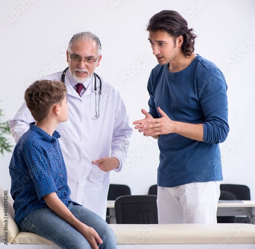 Young boy visiting doctor in hospital