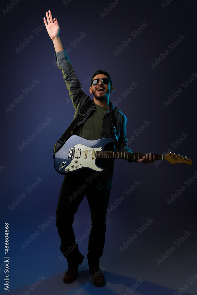 Fototapeta premium Famous rock star enjoying a concert