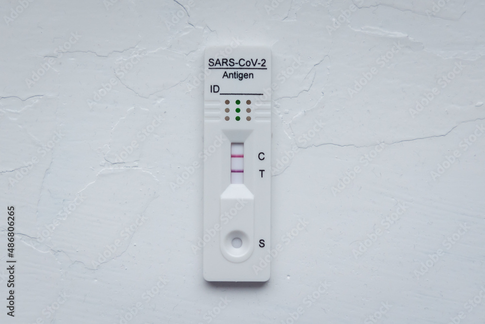 SARS-CoV-2 rapid antigen test with two colored lines - positive result ...