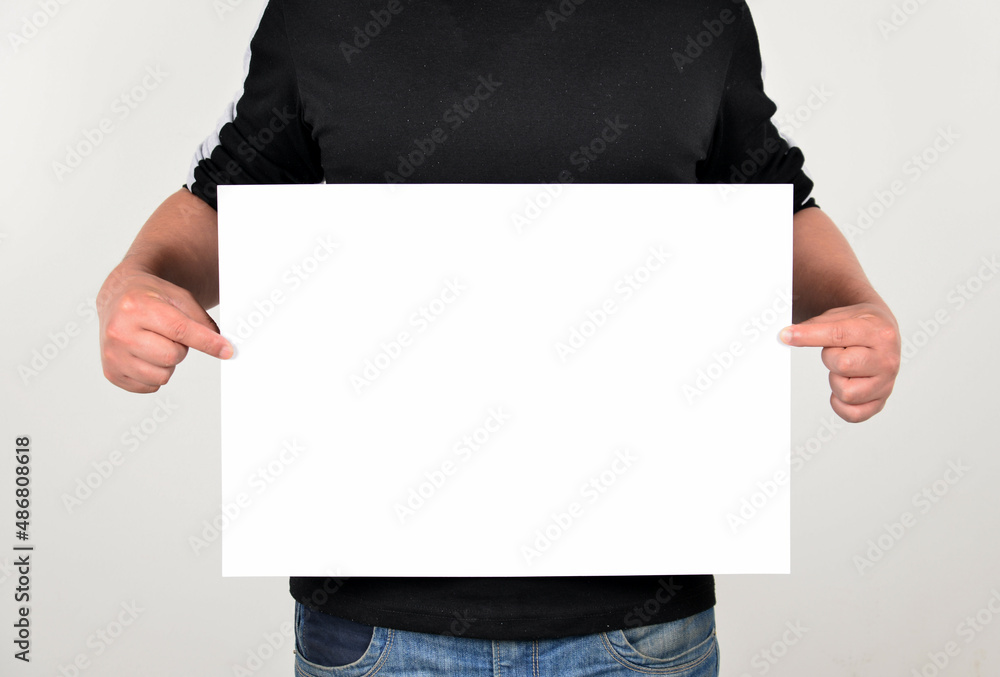 person holding a white board person holding a white board