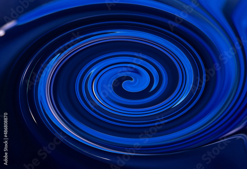 Blue swirling water ripple background