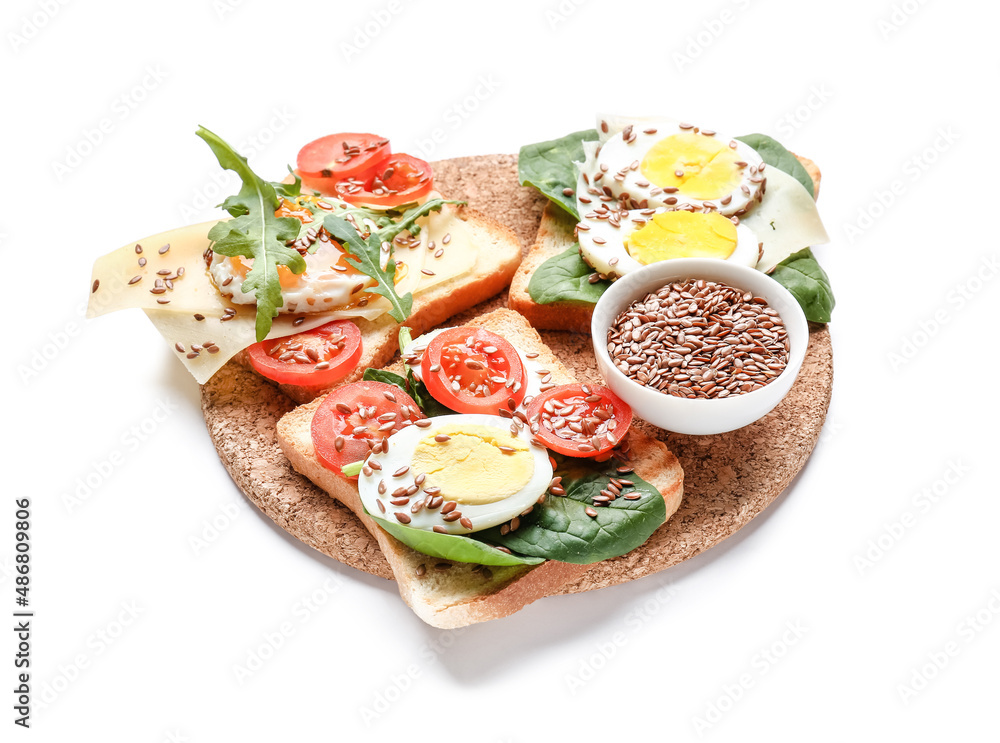 Board with tasty toasts isolated on white Board with tasty toasts isolated on white