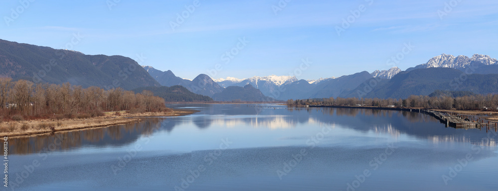 Perspective of river and snow-capped mountains Perspective of river and snow-capped mountains