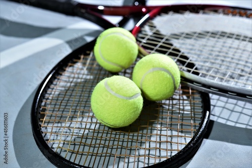 tennis racket and balls © taveesaksri