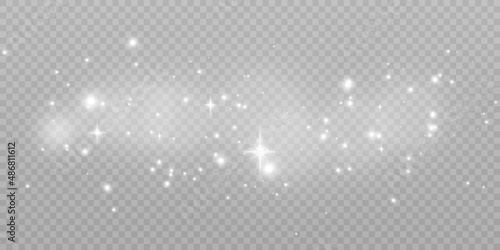 The dust sparks and golden stars shine with special light. Vector sparkles on a transparent background.