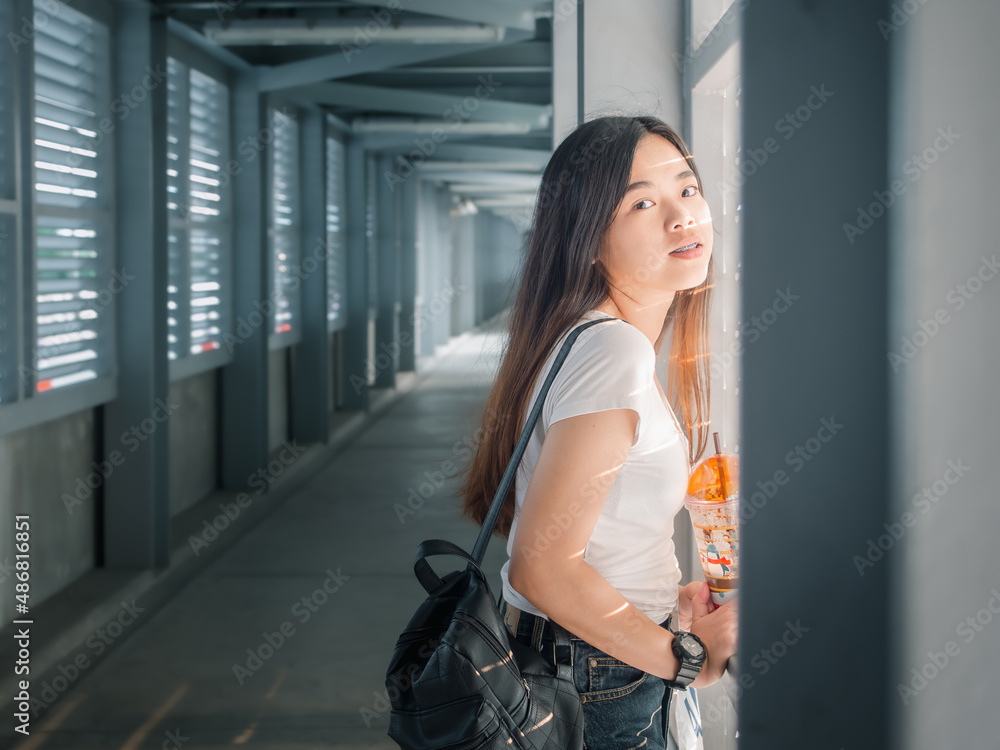 Portrait of happy Asian young woman outdoors Portrait of happy Asian young woman outdoors