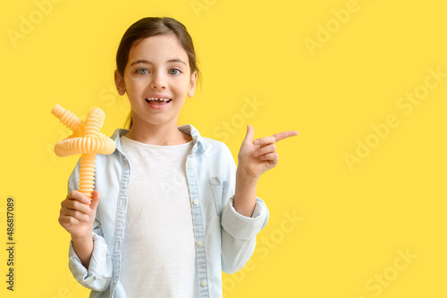 Little girl with Pop Tube p...