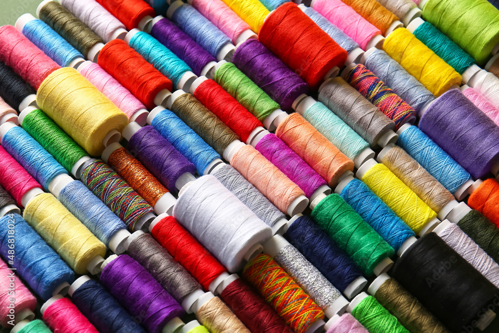 Set of spools with different sewing threads Set of spools with different sewing threads