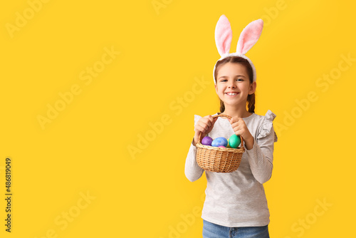 Funny little girl with bunn...