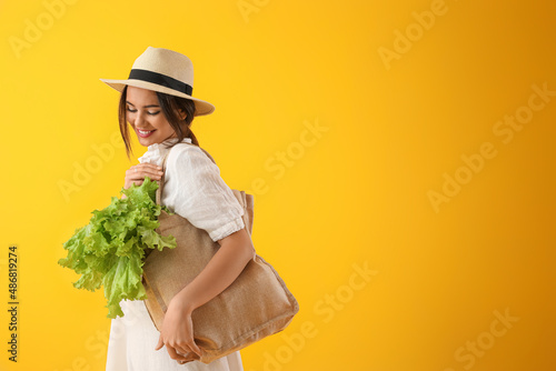 Young woman with eco bag an...