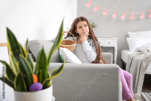 Cute little girl thinking a...